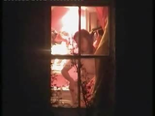 妖娆 模型 抓 裸体 在 她的 室 由 一 窗口 peeper